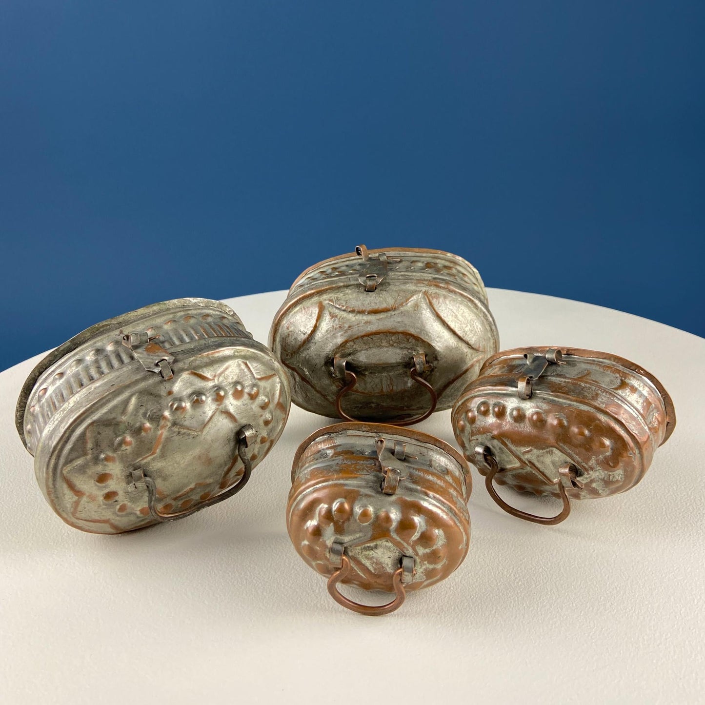 Hand Pounded Copper Cricket Boxes with Hinged Lids. Set of 4 Oval Metal Boxes with Perforated Bases. Rustic Collection of Containers.