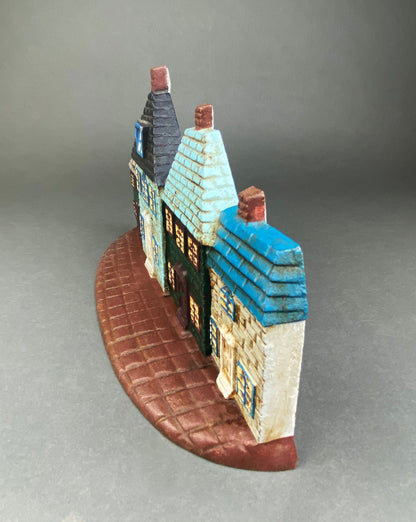 Vintage Cast Iron Door Stopper Shaped like Row of Houses