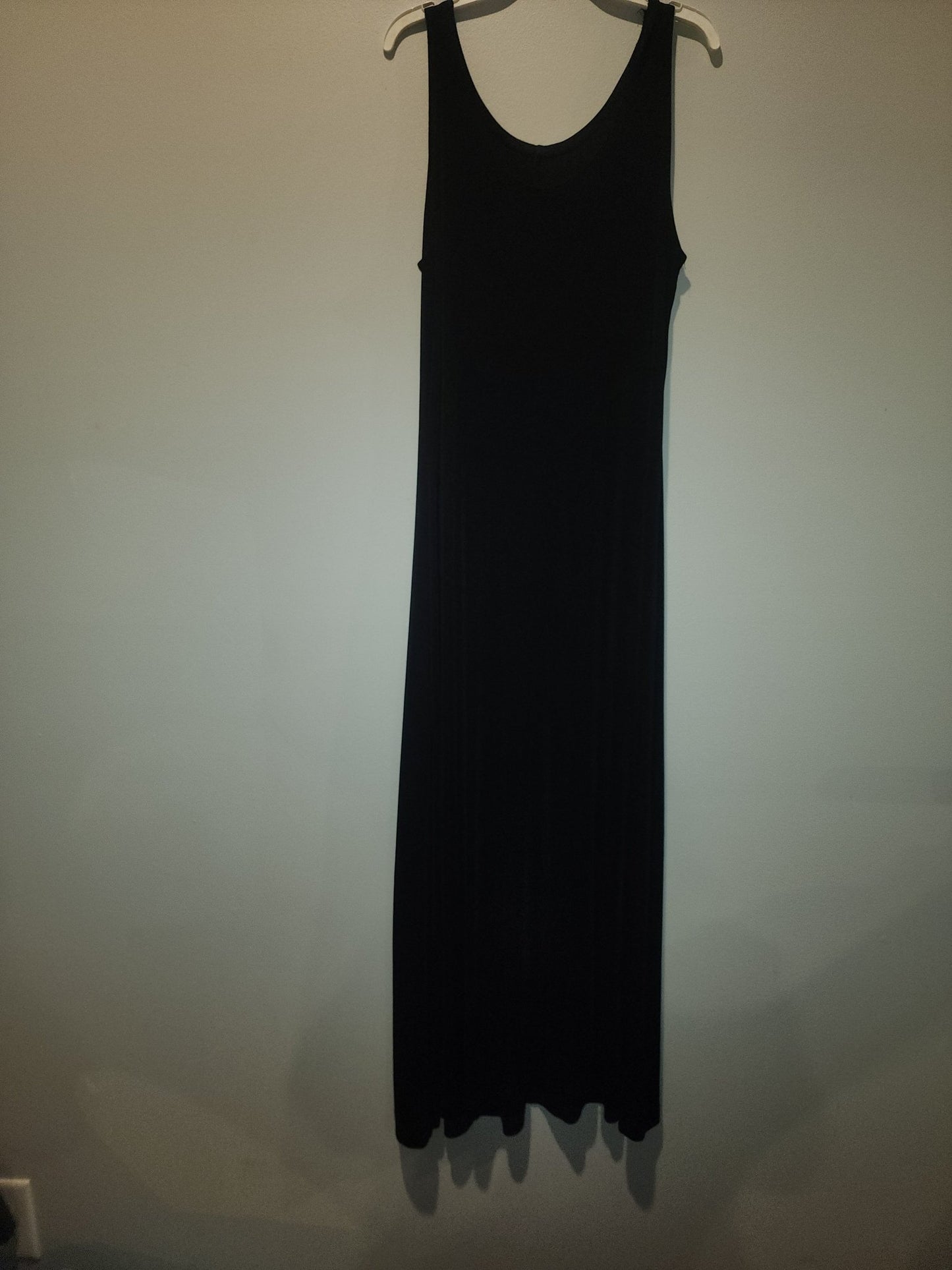 Black maxi dress paired with a short - sleeved top featuring a Giraffe Pattern M - I Bought a Yard Sale