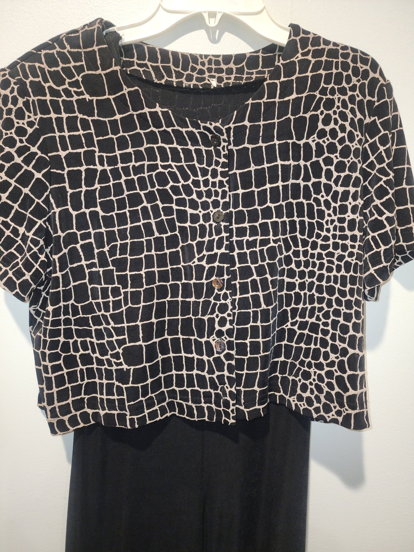 Black maxi dress paired with a short - sleeved top featuring a Giraffe Pattern M - I Bought a Yard Sale