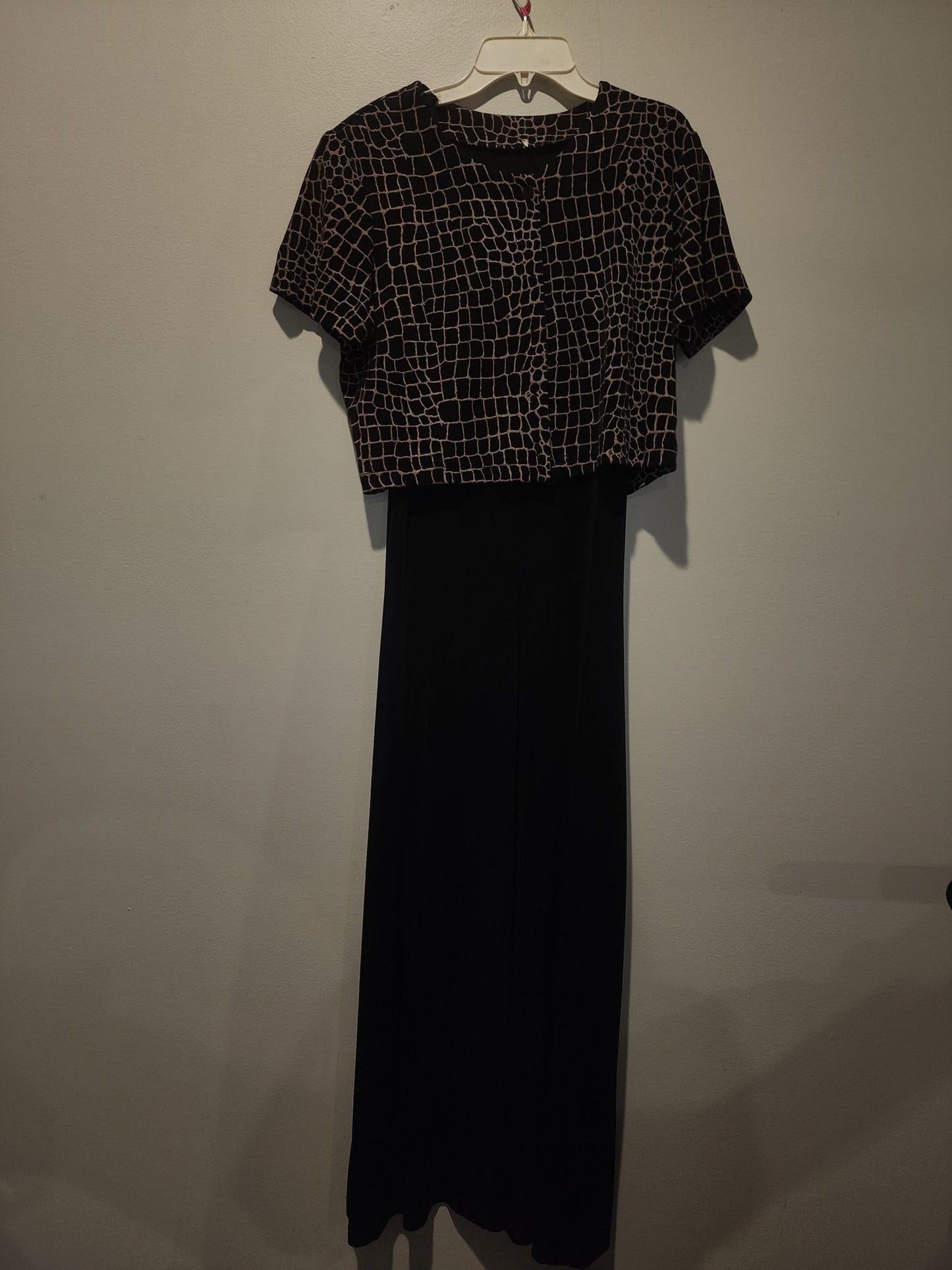 Black maxi dress paired with a short - sleeved top featuring a Giraffe Pattern M - I Bought a Yard Sale