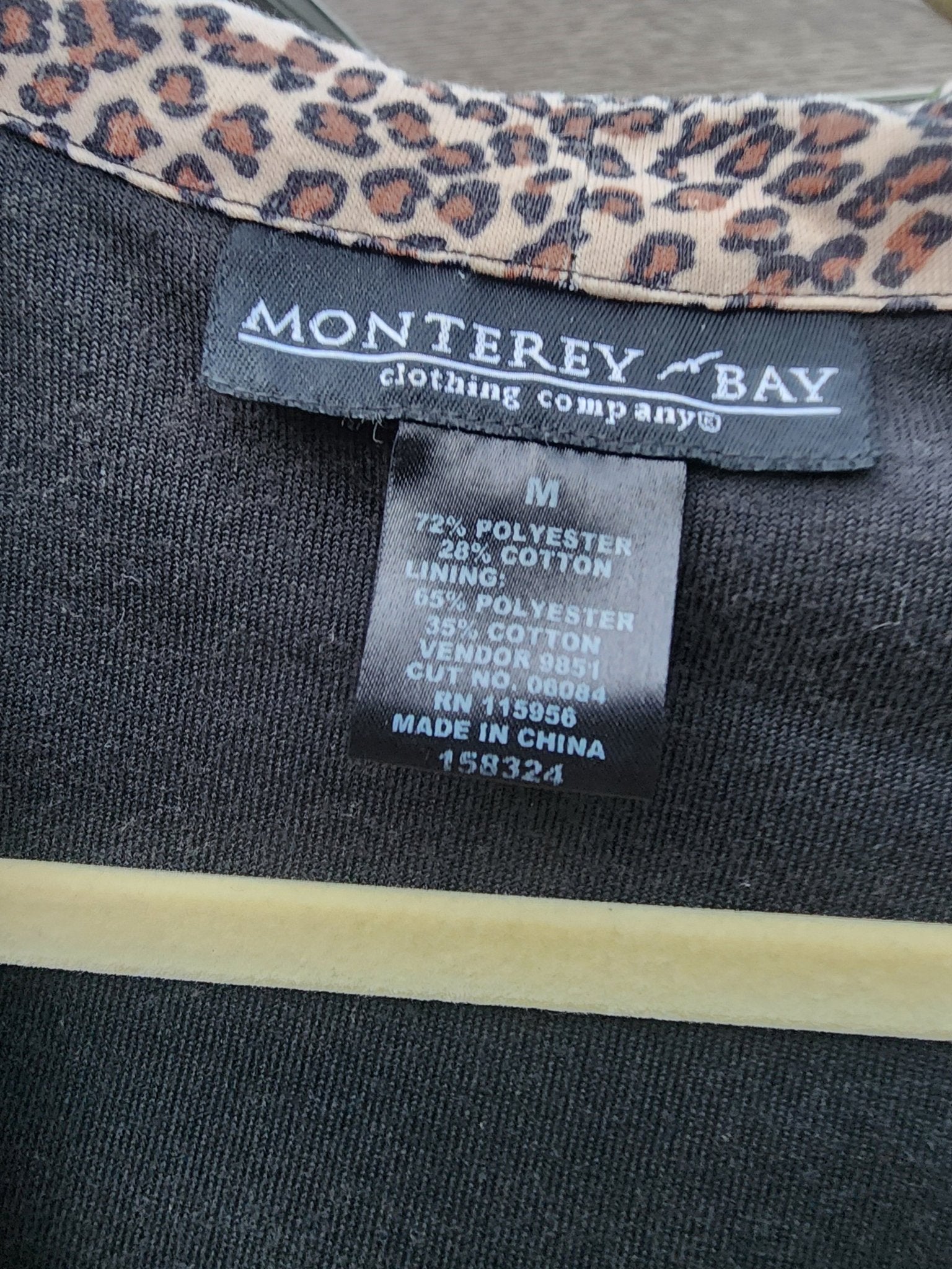Classic black with a fun, eye - catching leopard print hood and pocket trim. - I Bought a Yard Sale
