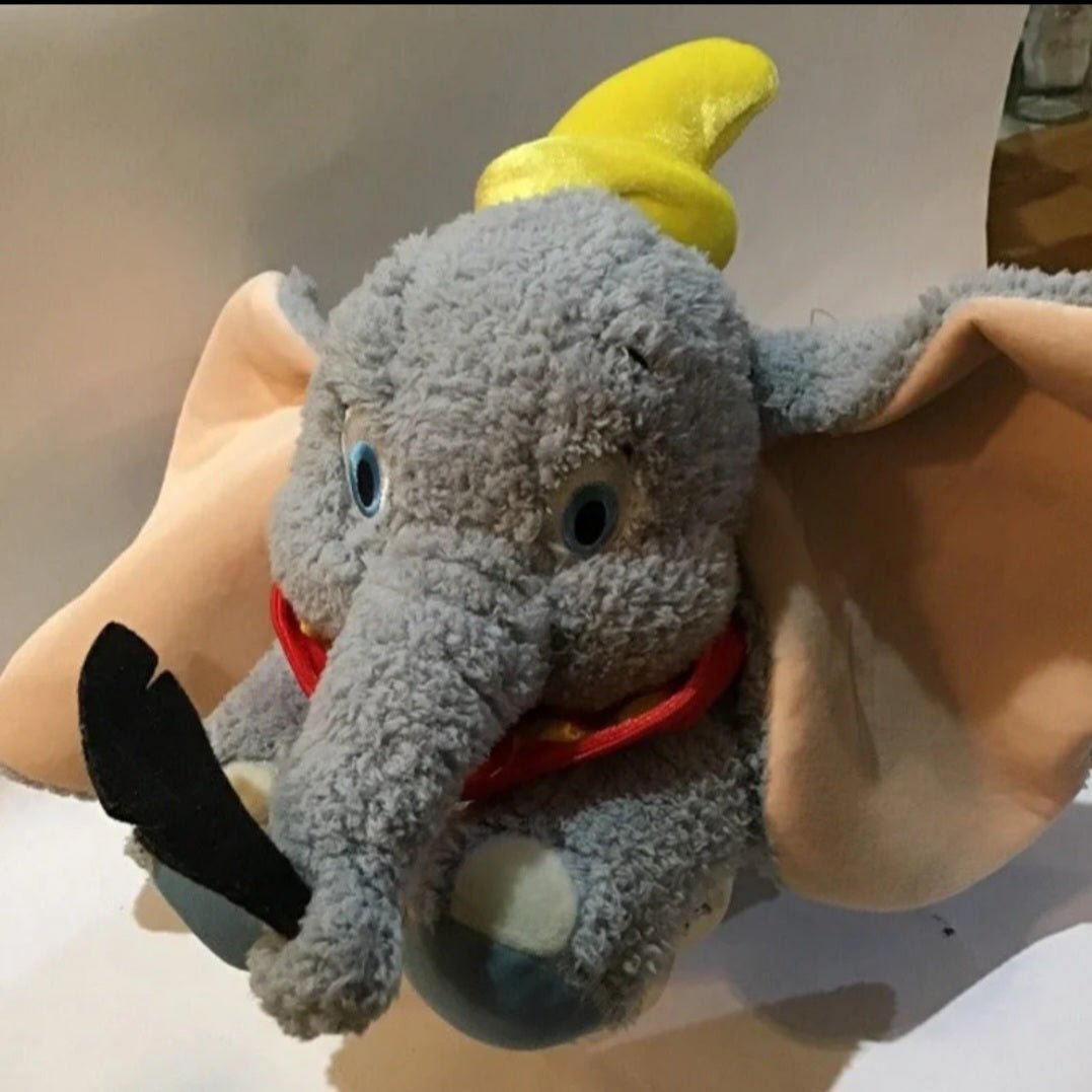 DISNEYLAND DUMBO FLYING ELEPHANT W FEATHER. (102) - I Bought a Yard Sale