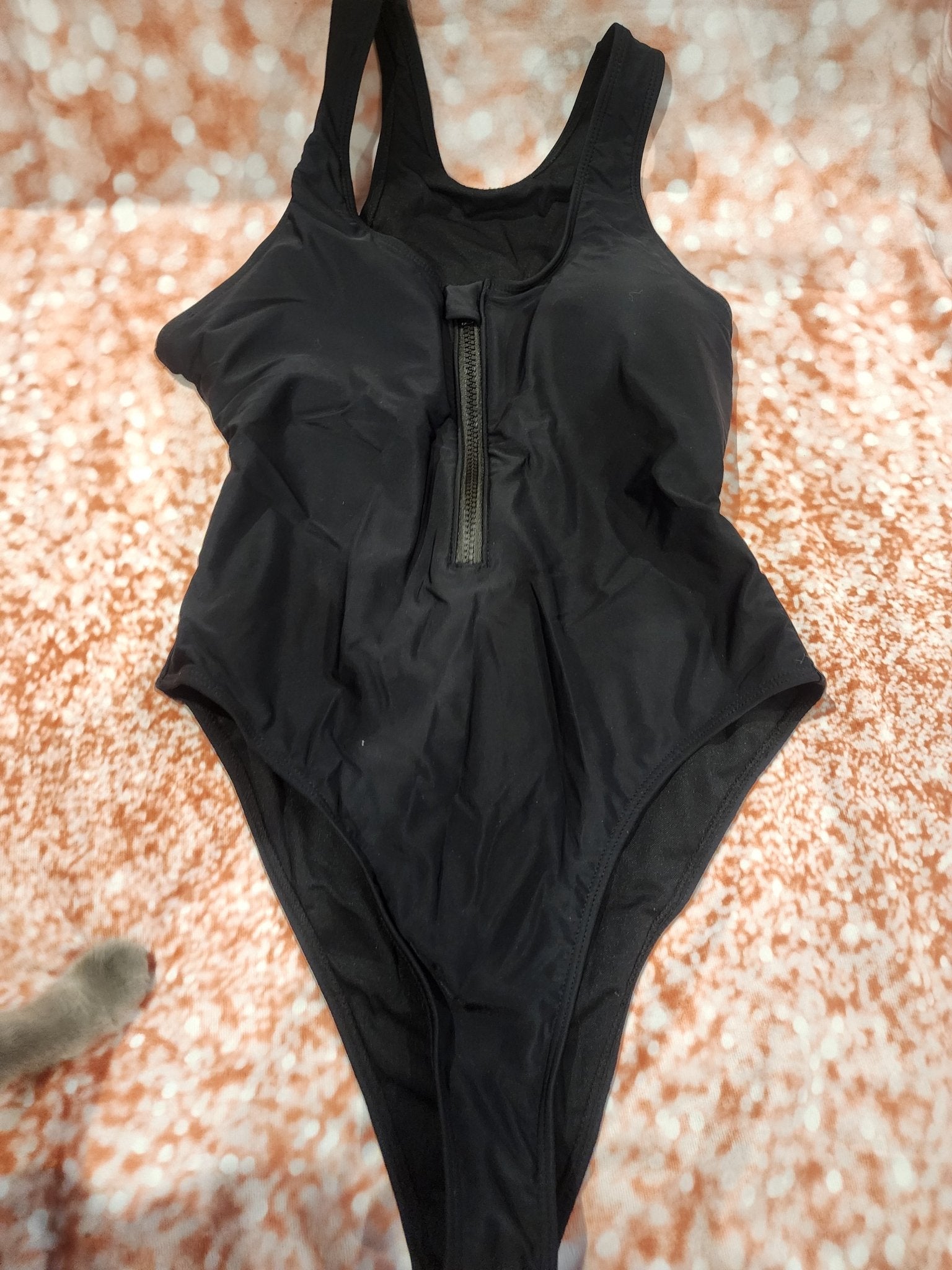 Sleek and stylish black one - piece swimsuit, perfect for the beach or pool L - I Bought a Yard Sale