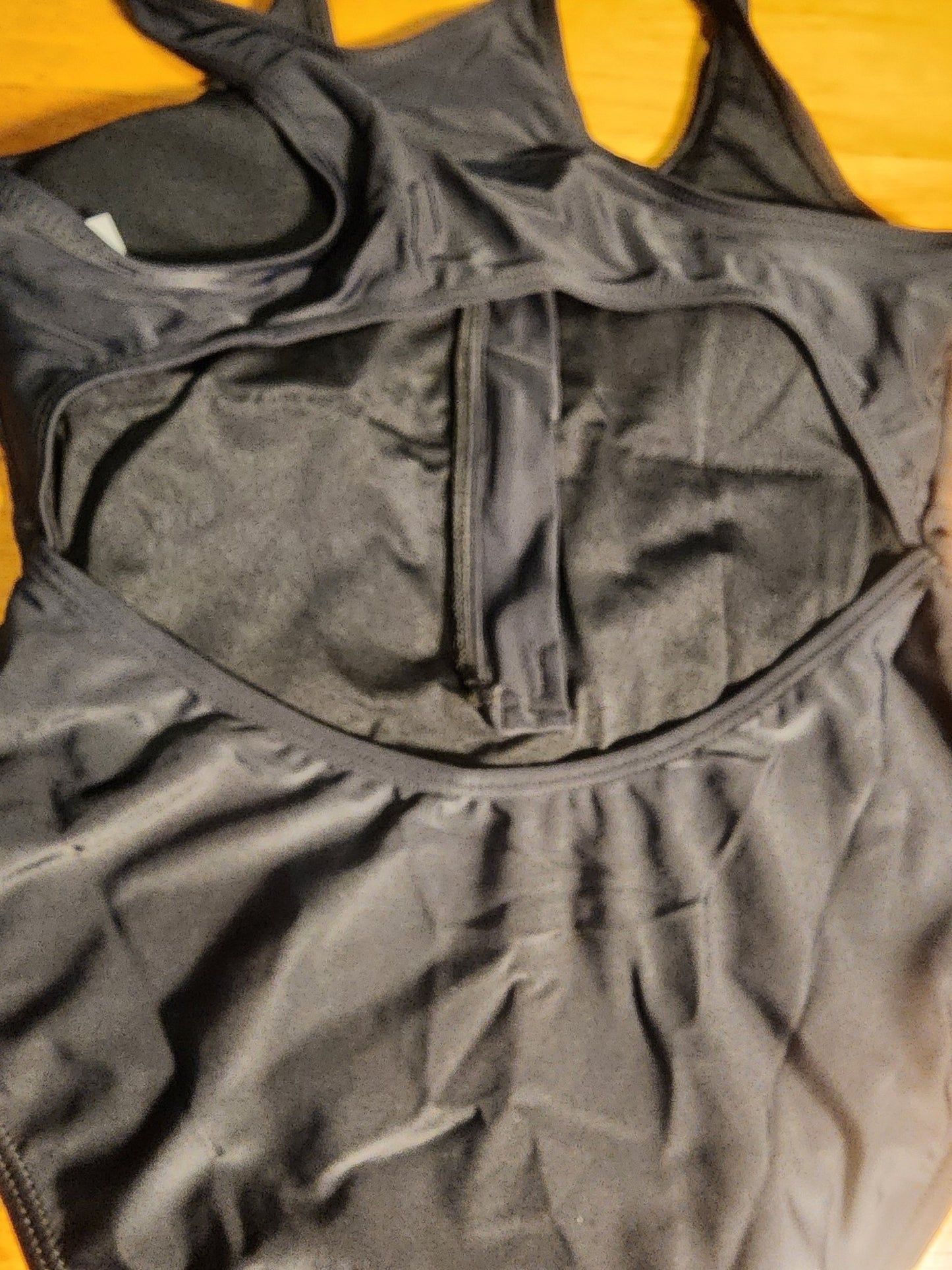 Sleek and stylish black one - piece swimsuit, perfect for the beach or pool L - I Bought a Yard Sale