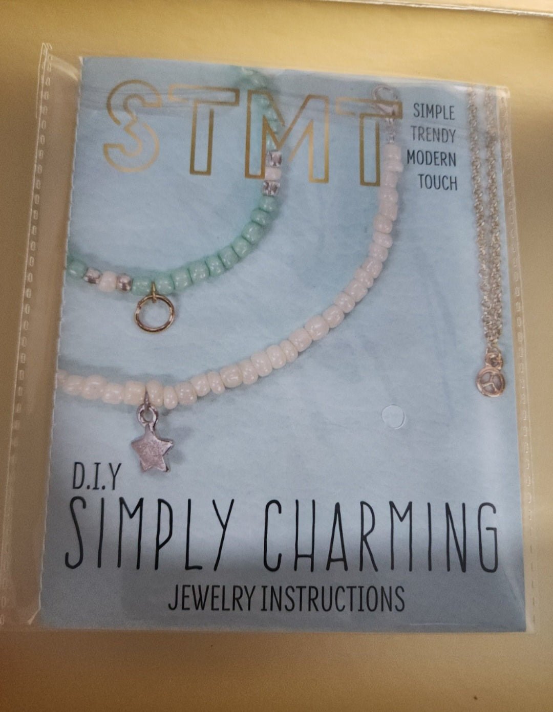 STMT DIY Jewelry kit as shown in photo with beads and charms. - I Bought a Yard Sale
