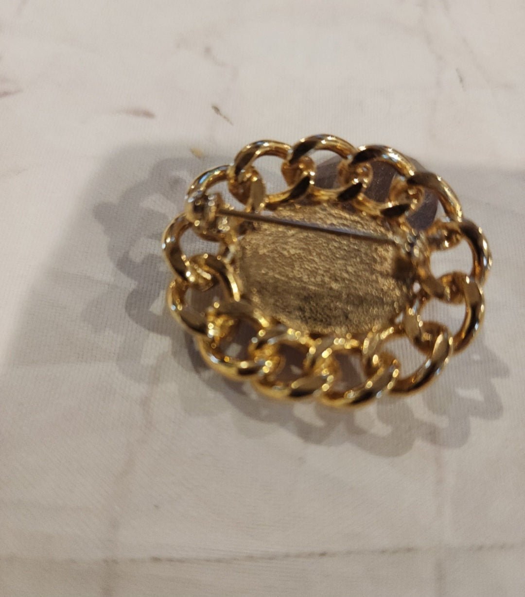 Vintage Unsigned Red Dome Brooch encased in a Gold tone setting. - I Bought a Yard Sale